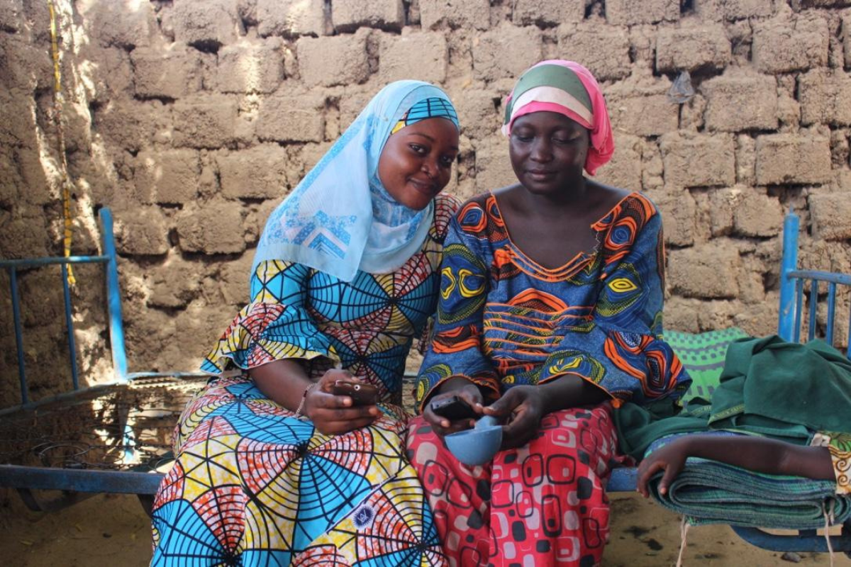 PMA-Two-Female-Resident-Enumerators-on-Phones