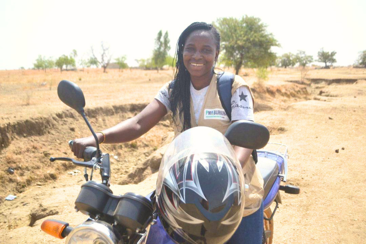 PMA-Burkina-Faso-Female-Resident-Enumerator-on_Motercycle