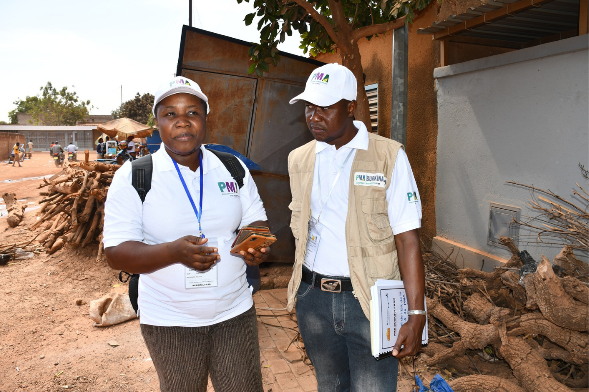 PMA-Female-and-Male-Resident-Enumerator_Collecting_Data